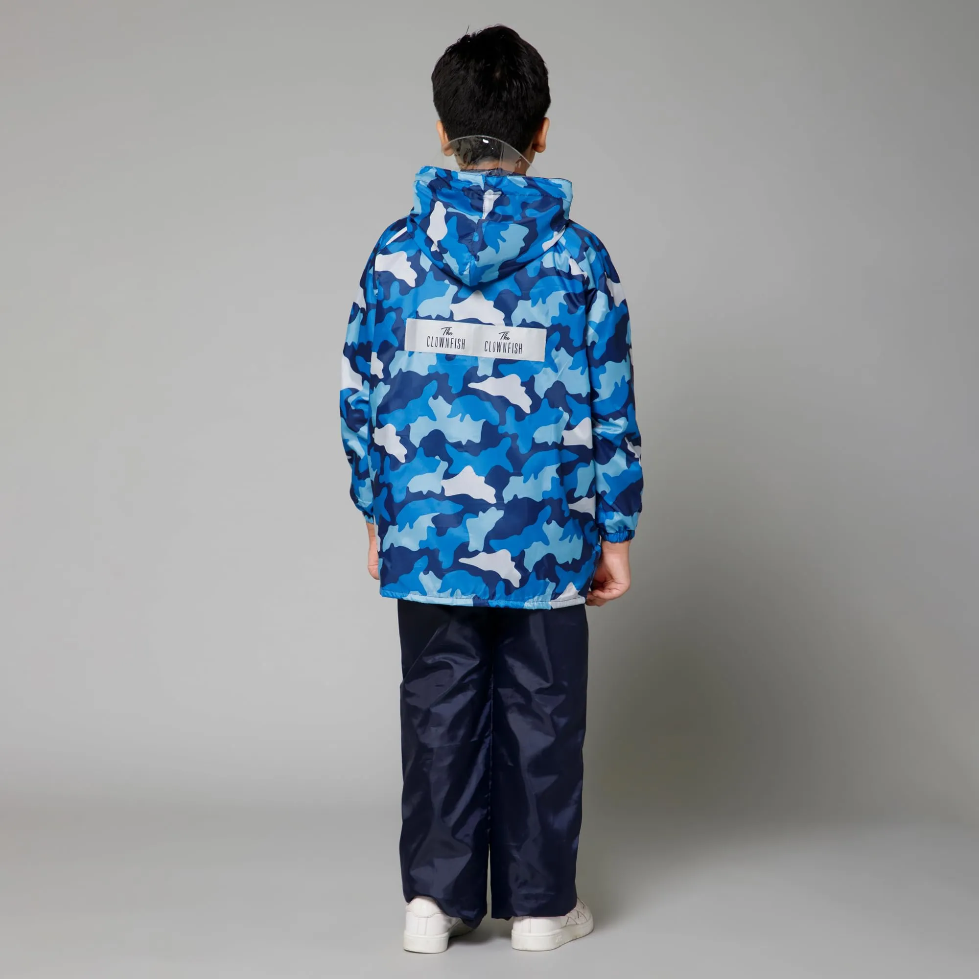 THE CLOWNFISH Comrad Series Kids Waterproof Nylon Double Coating Reversible Raincoat with Hood and Reflector Logo at Back. Set of Top and Bottom. Printed Plastic Pouch. Kid Age-5-7 years(Blue Camo)