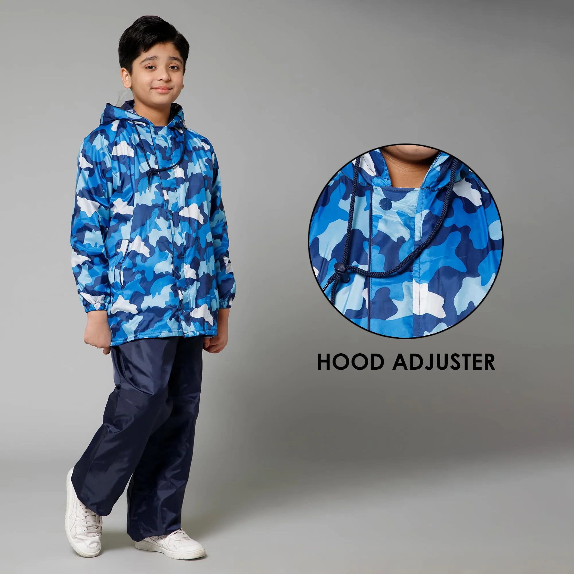 THE CLOWNFISH Comrad Series Kids Waterproof Nylon Double Coating Reversible Raincoat with Hood and Reflector Logo at Back. Set of Top and Bottom. Printed Plastic Pouch. Kid Age-5-7 years(Blue Camo)