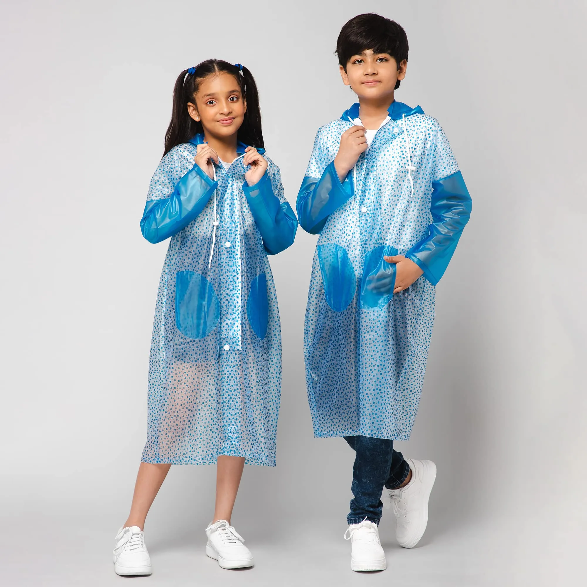 THE CLOWNFISH Drench Dew Series Unisex Kids Waterproof Single Layer PVC Longcoat/Raincoat with Adjustable Hood. Age-6-7 Years (Sky Blue)