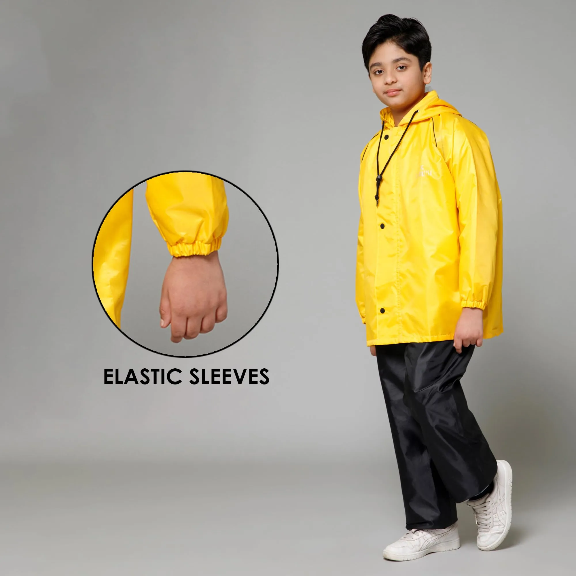 THE CLOWNFISH Duke Series Kids Waterproof Polyester Double Coating Reversible Raincoat with Hood and Reflector Logo at Back. Set of Top and Bottom. Printed Plastic Pouch. Kid Age-5-7 years (Yellow)