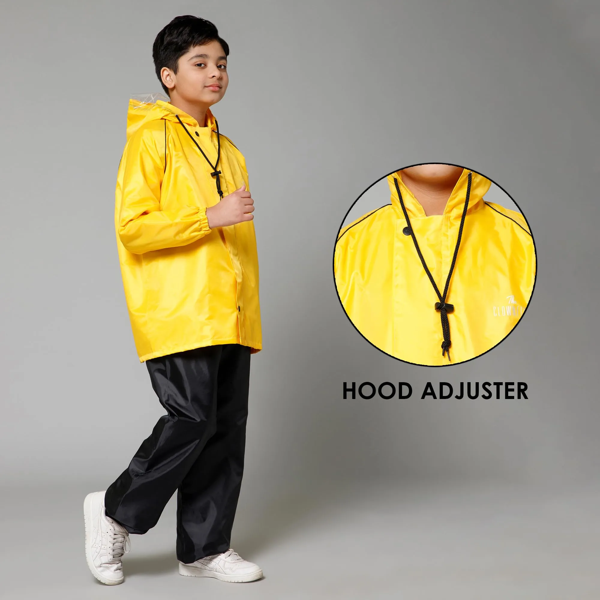 THE CLOWNFISH Duke Series Kids Waterproof Polyester Double Coating Reversible Raincoat with Hood and Reflector Logo at Back. Set of Top and Bottom. Printed Plastic Pouch. Kid Age-5-7 years (Yellow)