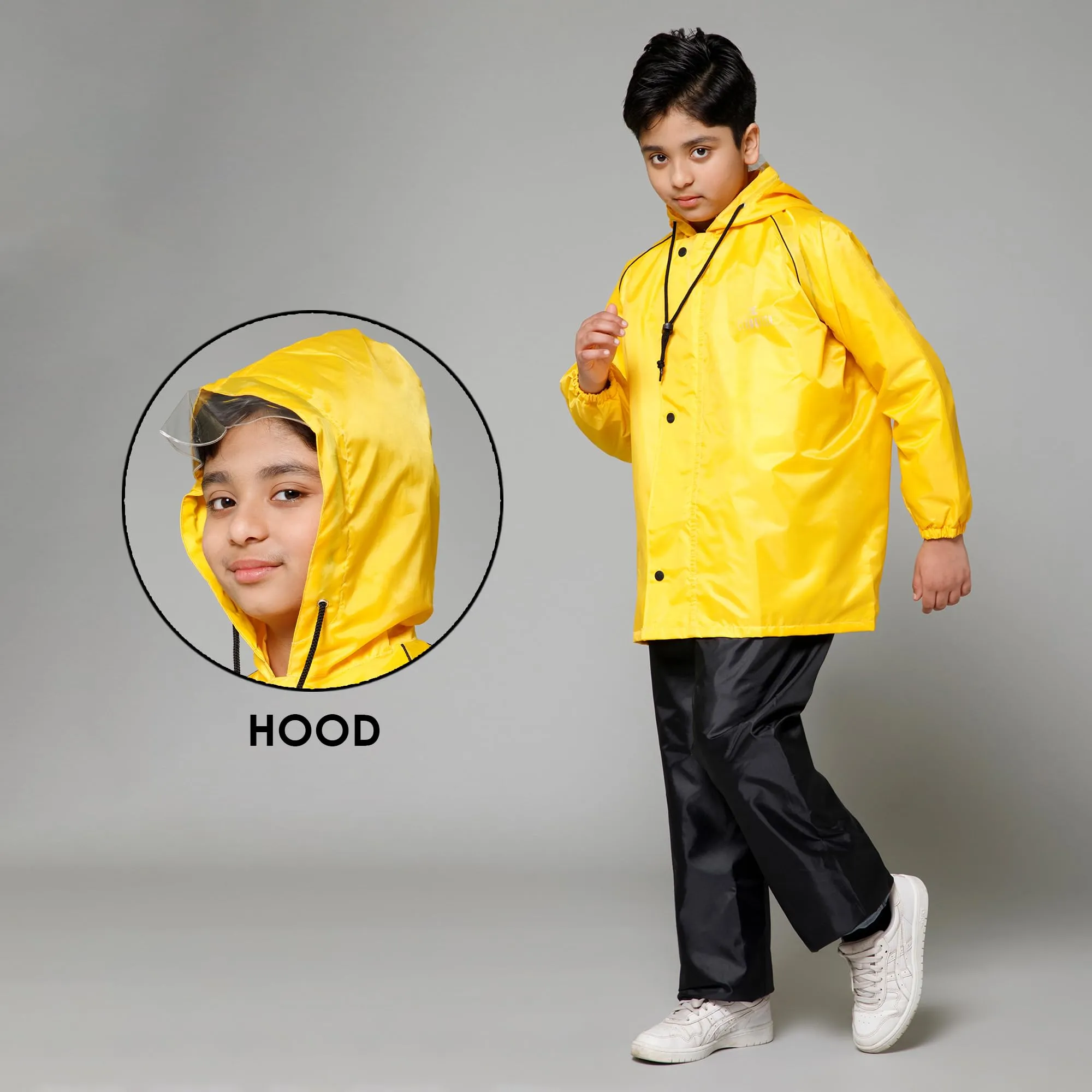 THE CLOWNFISH Duke Series Kids Waterproof Polyester Double Coating Reversible Raincoat with Hood and Reflector Logo at Back. Set of Top and Bottom. Printed Plastic Pouch. Kid Age-5-7 years (Yellow)