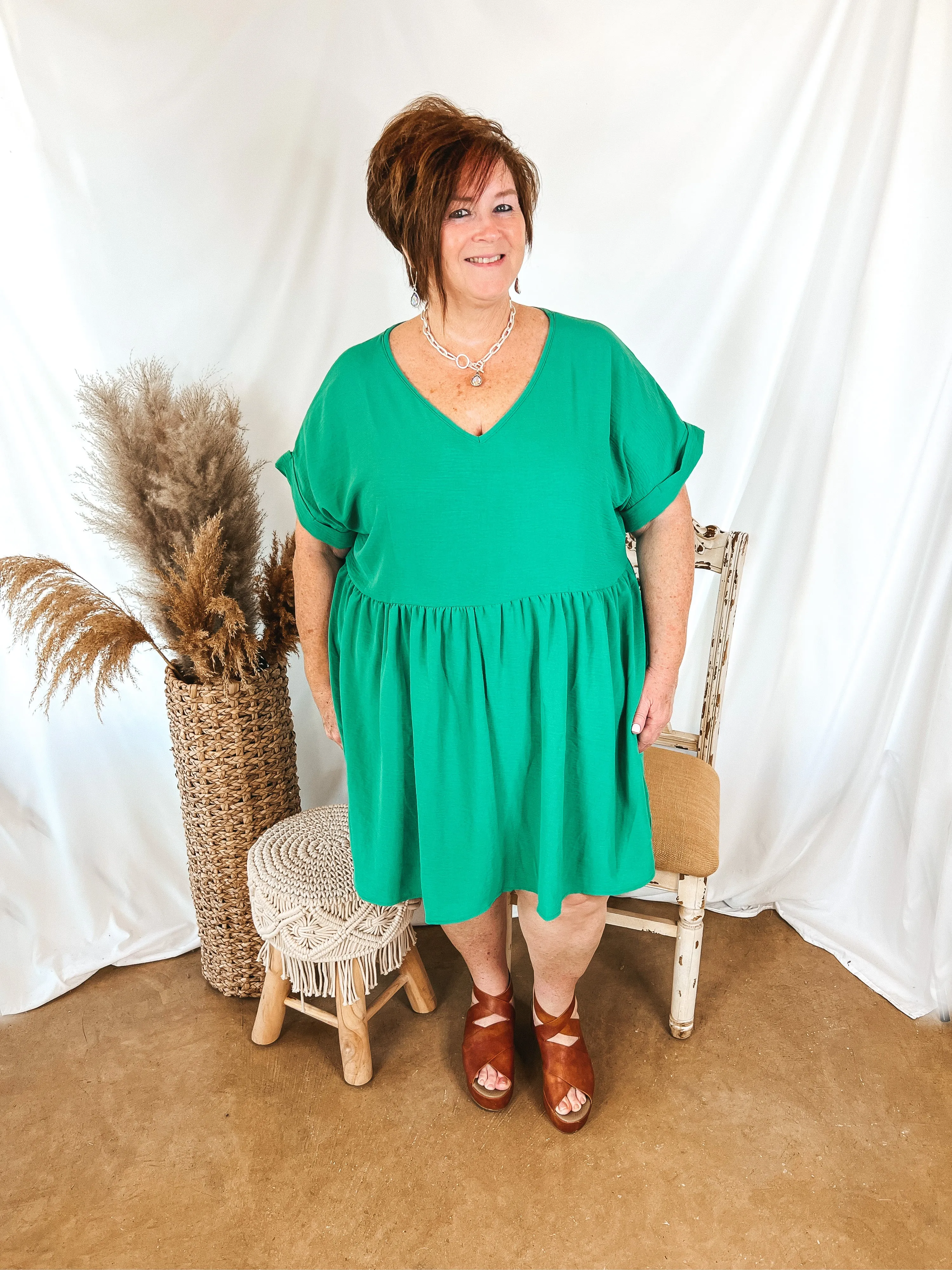 Touring the City V Neck Babydoll Dress in Green